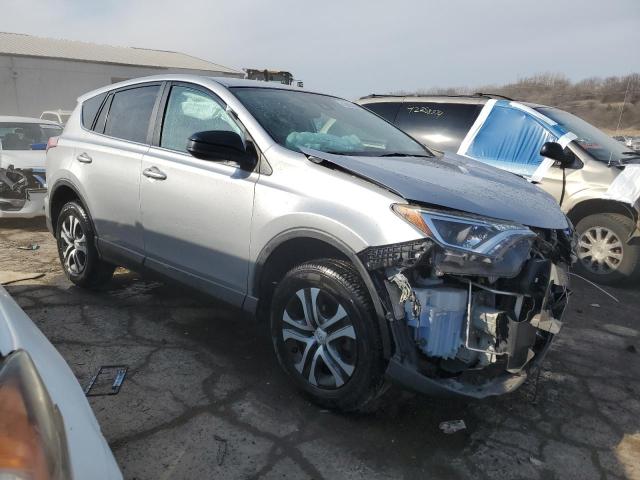 2T3BFREV8JW765129 - 2018 TOYOTA RAV4 LE SILVER photo 4