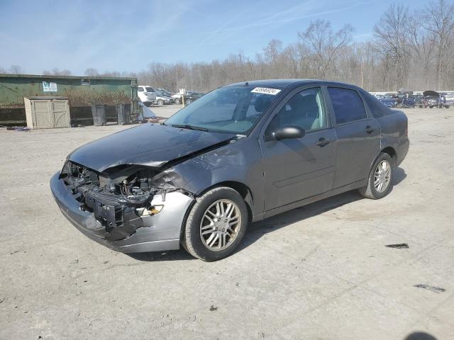 1FAFP34N85W110124 - 2005 FORD FOCUS ZX4 GRAY photo 1