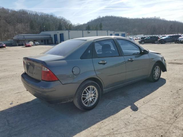 1FAFP34N85W110124 - 2005 FORD FOCUS ZX4 GRAY photo 3