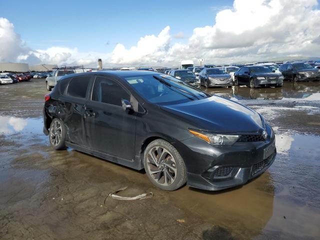 JTNKARJE0JJ556935 - 2018 TOYOTA COROLLA IM BLACK photo 4