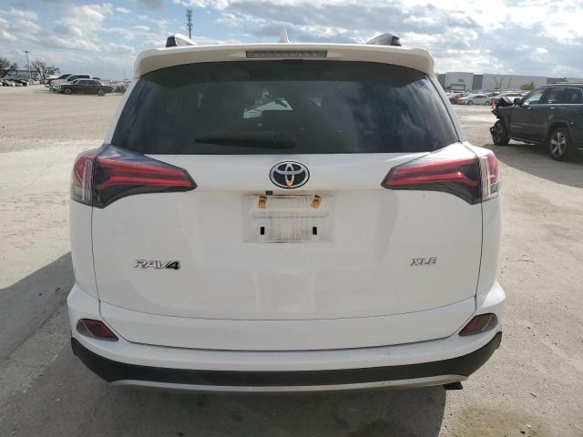 JTMWFREV4JJ729857 - 2018 TOYOTA RAV4 ADVENTURE WHITE photo 6