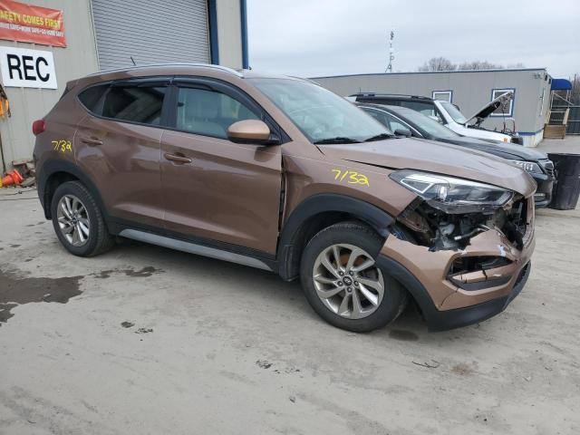 KM8J3CA49HU401979 - 2017 HYUNDAI TUCSON LIMITED BROWN photo 4