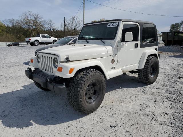 1J4FA59S8YP703545 - 2000 JEEP WRANGLER / SAHARA WHITE photo 1