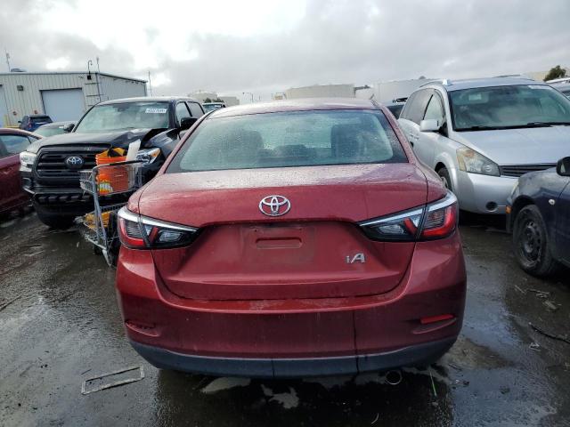 3MYDLBYV2JY316075 - 2018 TOYOTA YARIS IA RED photo 6