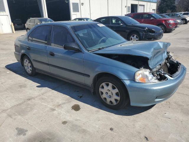 1HGEJ667XYL028989 - 2000 HONDA CIVIC LX SILVER photo 4