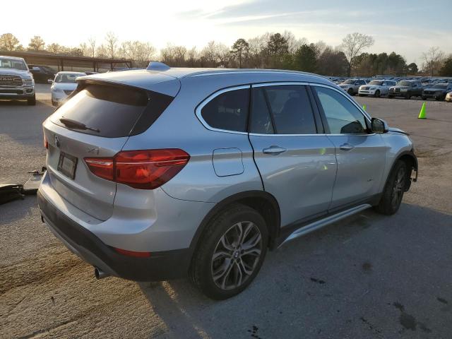 WBXHT3Z36H4A54521 - 2017 BMW X1 XDRIVE28I SILVER photo 3