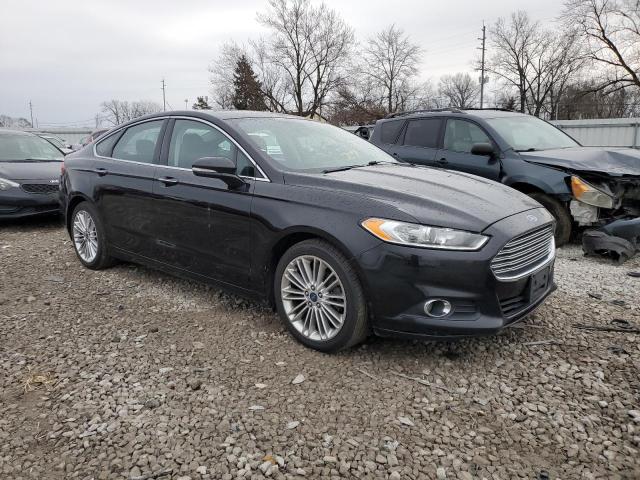 3FA6P0T9XGR127810 - 2016 FORD FUSION SE BLACK photo 4