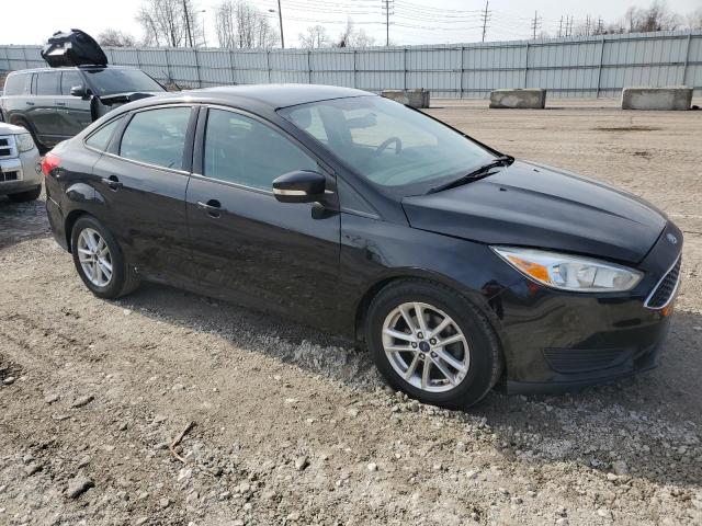 1FADP3F20GL310851 - 2016 FORD FOCUS SE BLACK photo 4