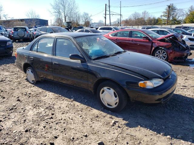 1Y1SK52842Z414900 - 2002 CHEVROLET GEO PRIZM BASE BLACK photo 4