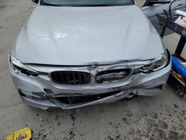 WBA8B3C54JK384583 - 2018 BMW 340 I Plata foto 11