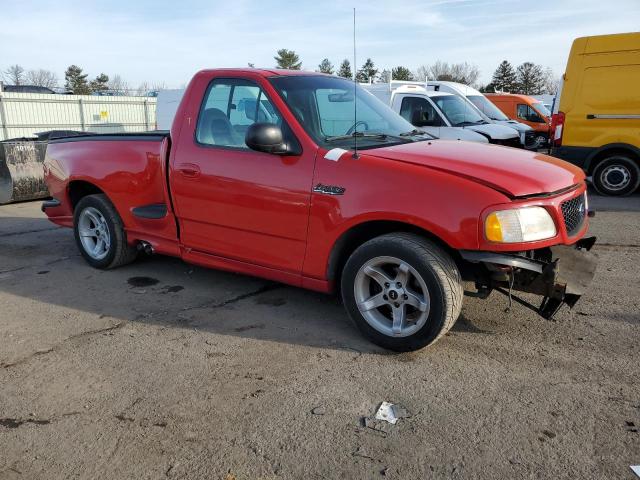 2FTZF073XXCA82862 - 1999 FORD F150 SVT LIGHTNING RED photo 4