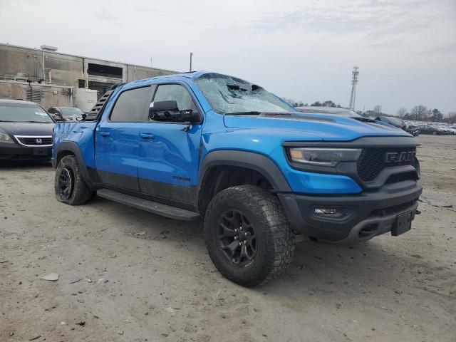 1C6SRFU96MN718579 - 2021 RAM 1500 TRX BLUE photo 4