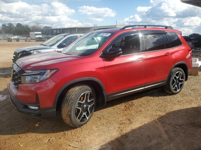 5FNYF8H02PB025983 - 2023 HONDA PASSPORT ELITE RED photo 1