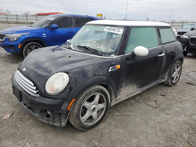 WMWMF3C56ATU76274 - 2010 MINI COOPER BLACK photo 1