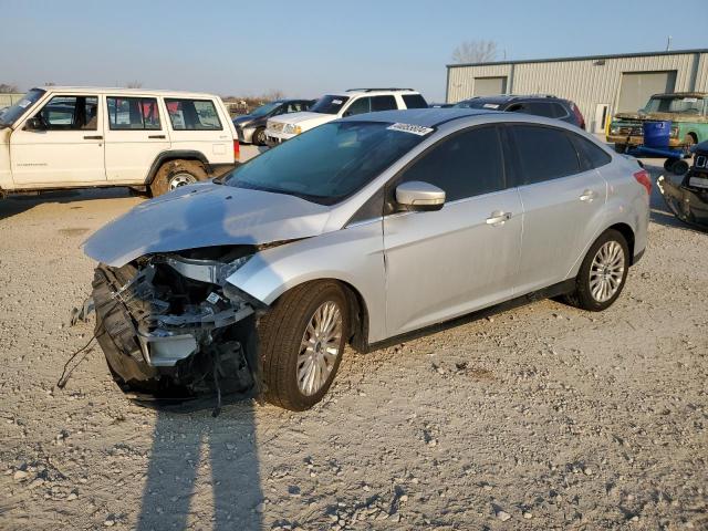 1FAHP3J24CL476454 - 2012 FORD FOCUS TITANIUM SILVER photo 1