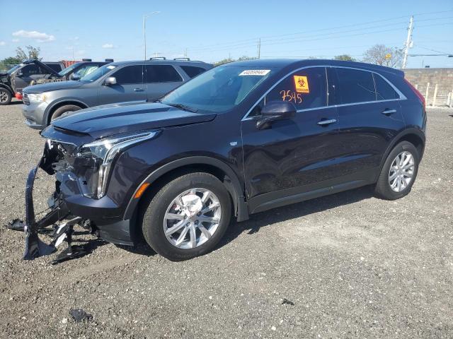 1GYAZAR43NF160393 - 2022 CADILLAC XT4 LUXURY BLACK photo 1