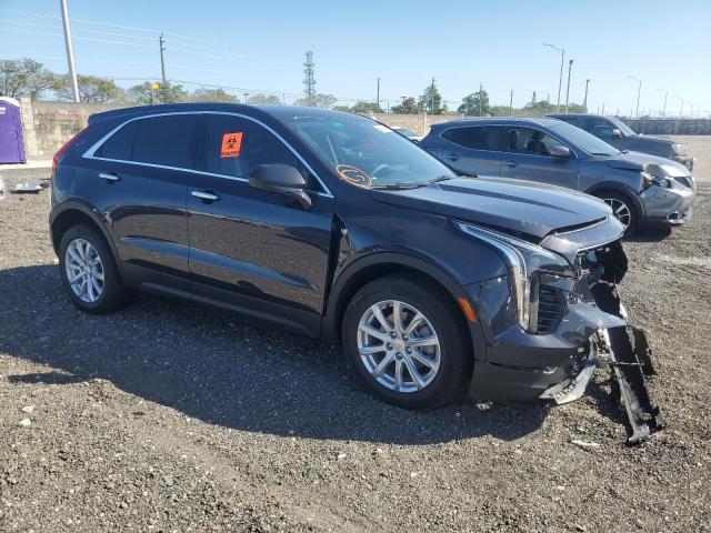 1GYAZAR43NF160393 - 2022 CADILLAC XT4 LUXURY BLACK photo 4