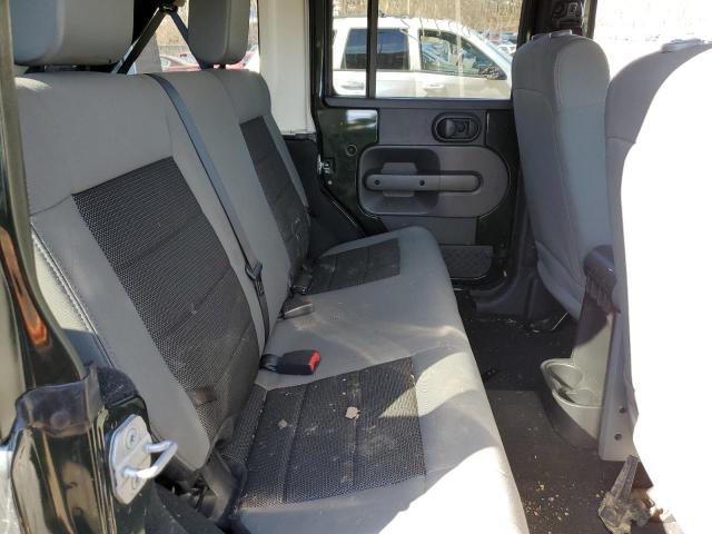 1J4HA5H13AL129614 - 2010 JEEP WRANGLER U SAHARA GREEN photo 11