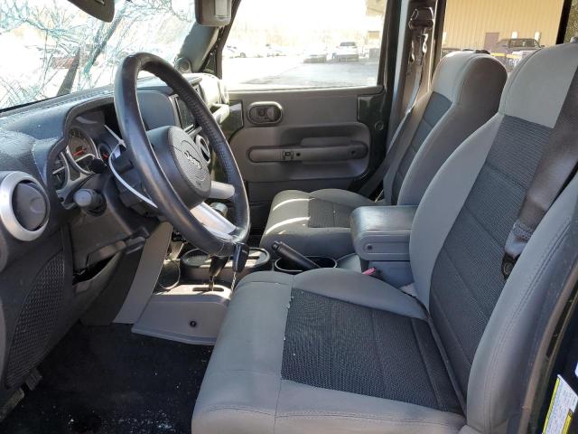 1J4HA5H13AL129614 - 2010 JEEP WRANGLER U SAHARA GREEN photo 7