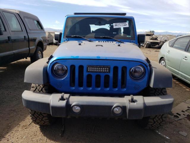 1C4BJWDG7GL114540 - 2016 JEEP WRANGLER U SPORT BLUE photo 5