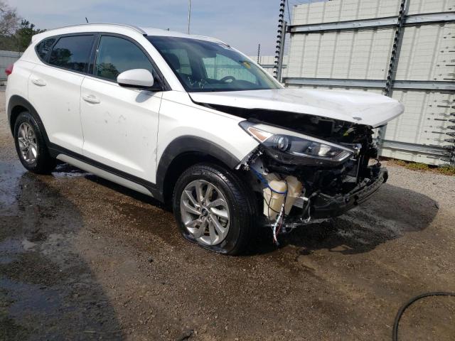 KM8J33A49HU462619 - 2017 HYUNDAI TUCSON LIMITED WHITE photo 4