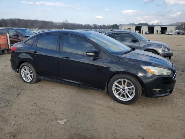 1FADP3F25FL202529 - 2015 FORD FOCUS SE BLACK photo 4