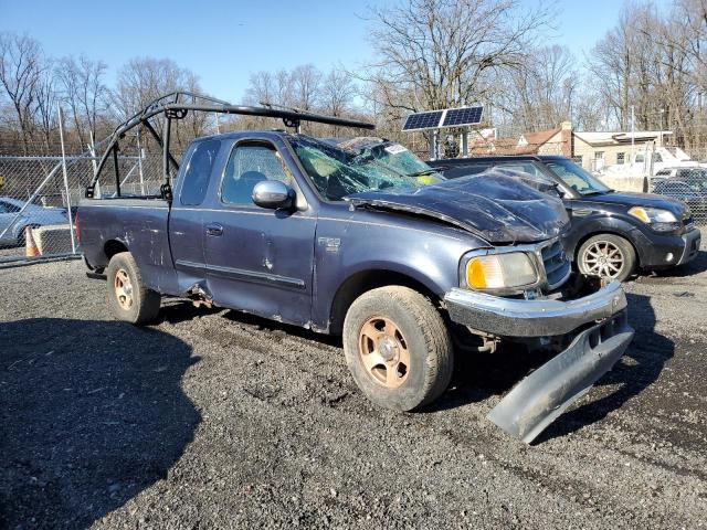 1FTRX17W4YNB10986 - 2000 FORD F150 BLUE photo 4