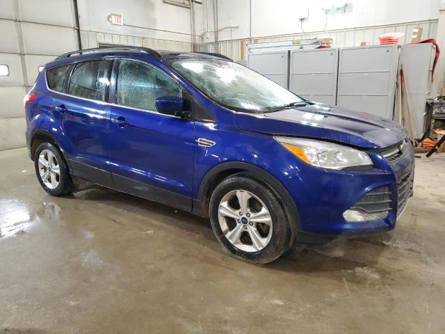 1FMCU0G94FUC81545 - 2015 FORD ESCAPE SE BLUE photo 4