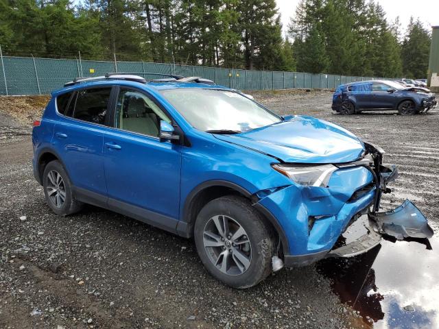 JTMRFREV5GJ061010 - 2016 TOYOTA RAV4 XLE BLUE photo 4