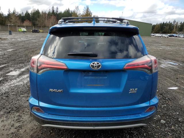 JTMRFREV5GJ061010 - 2016 TOYOTA RAV4 XLE BLUE photo 6