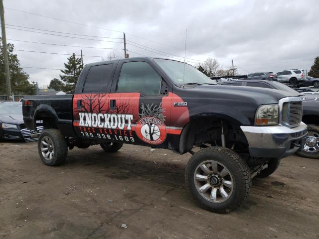 1FTNW21P54EA31264 - 2004 FORD F250 SUPER BLACK photo 4