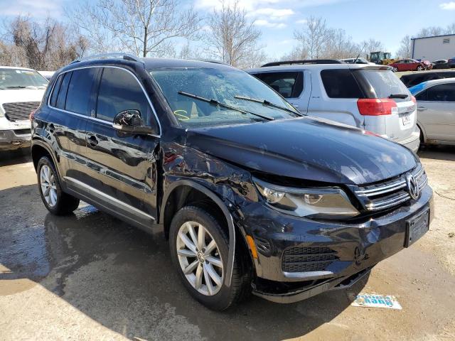 WVGSV7AX8HW508719 - 2017 VOLKSWAGEN TIGUAN WOLFSBURG BLACK photo 4