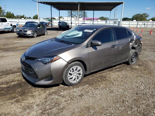 5YFBURHE5KP868120 - 2019 TOYOTA COROLLA L GRAY photo 1