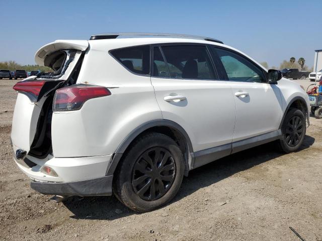 2T3ZFREV0GW291457 - 2016 TOYOTA RAV4 LE WHITE photo 3