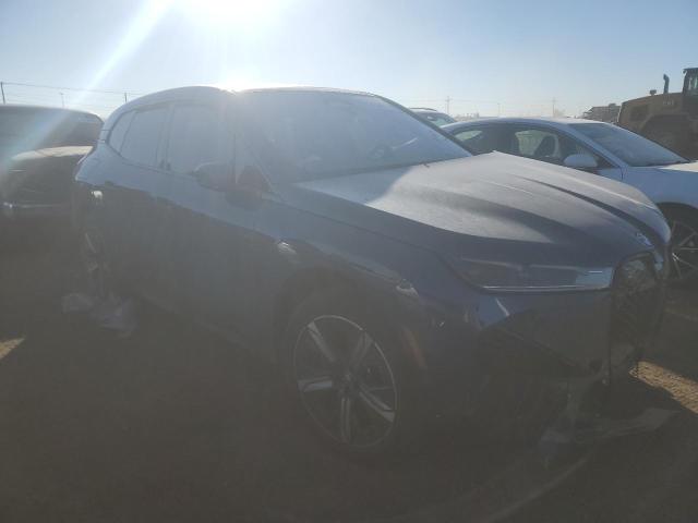 WB523CF08RCP39620 - 2024 BMW IX XDRIVE50 BLUE photo 4
