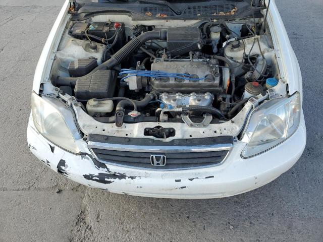 1HGEJ6670YL060785 - 2000 HONDA CIVIC LX WHITE photo 11