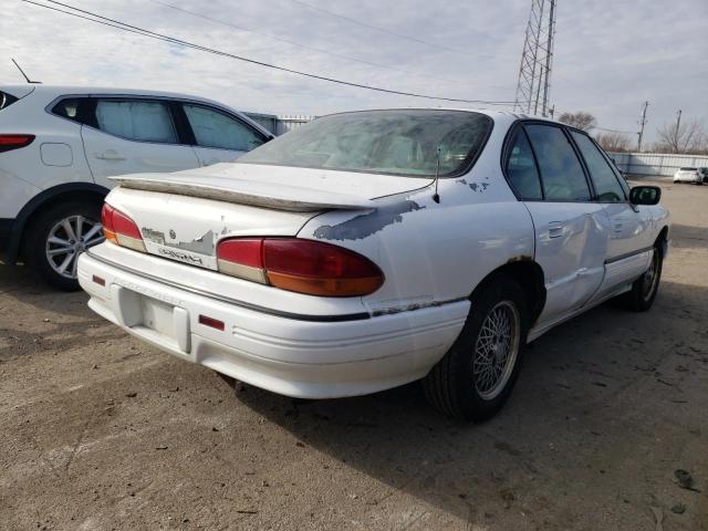 1G2HX52KXS4237055 - 1995 PONTIAC BONNEVILLE SE WHITE photo 3