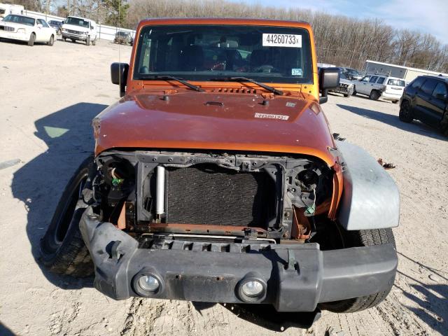 1J4AA2D15BL507052 - 2011 JEEP WRANGLER SPORT ORANGE photo 5