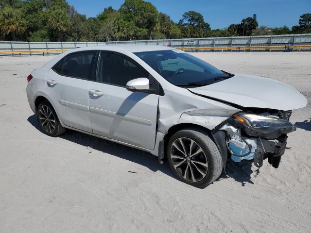 5YFBURHE8HP674674 - 2017 TOYOTA COROLLA L WHITE photo 4