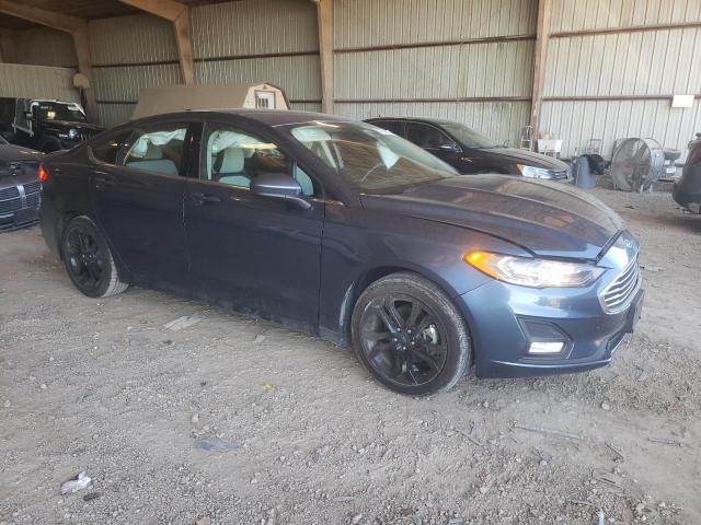 3FA6P0HD7KR239566 - 2019 FORD FUSION SE BLUE photo 4