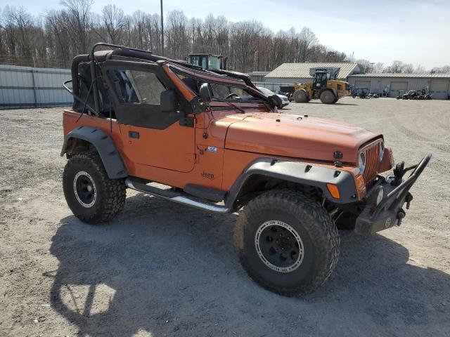 1J4FA49S22P702733 - 2002 JEEP WRANGLER / SPORT ORANGE photo 4