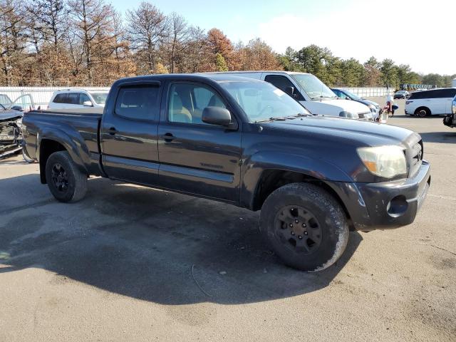 5TEMU4FN9AZ689859 - 2010 TOYOTA TACOMA DOUBLE CAB LONG BED BLACK photo 4