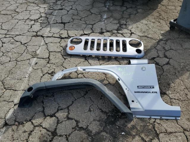 1C4AJWAG8DL680623 - 2013 JEEP WRANGLER SPORT SILVER photo 12