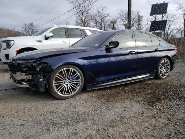 WBA13BK02NCH70646 - 2022 BMW M550XI BLUE photo 1