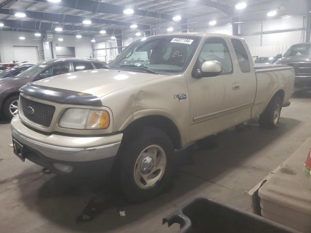 1FTRX18L3YNA44600 - 2000 FORD F150 GOLD photo 1