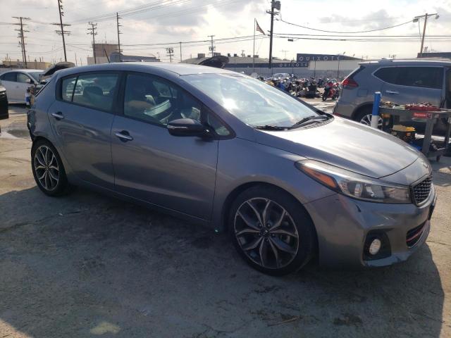 3KPFN5A34HE155493 - 2017 KIA FORTE EX GRAY photo 4