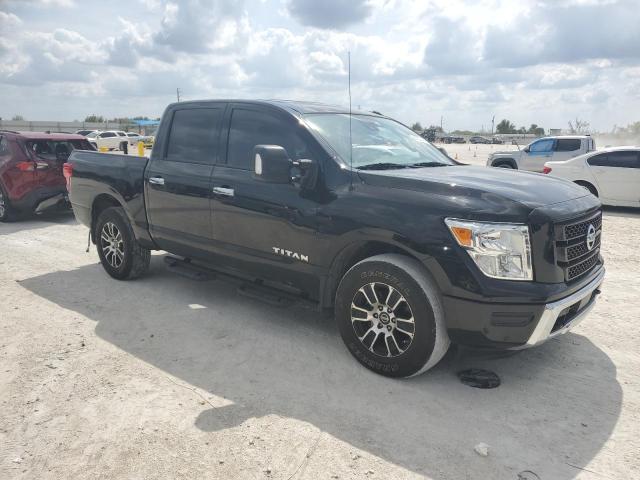 1N6AA1ED0MN527268 - 2021 NISSAN TITAN SV BLACK photo 4