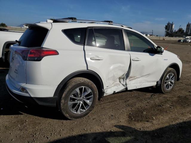 JTMRJREV6GD050689 - 2016 TOYOTA RAV4 HV XLE WHITE photo 3