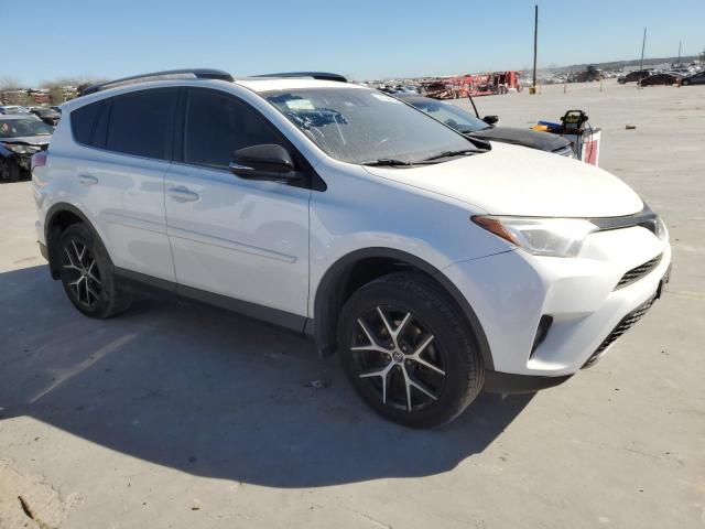 JTMNFREV6JJ736370 - 2018 TOYOTA RAV4 SE WHITE photo 4