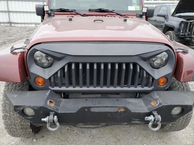 1J4FA54179L741047 - 2009 JEEP WRANGLER SAHARA RED photo 11